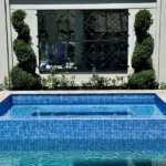 English Box Spiral topiary , create a striking focal point in contemporary or classic style gardens. Ideal for large planter pots, available from Impressive Plants.